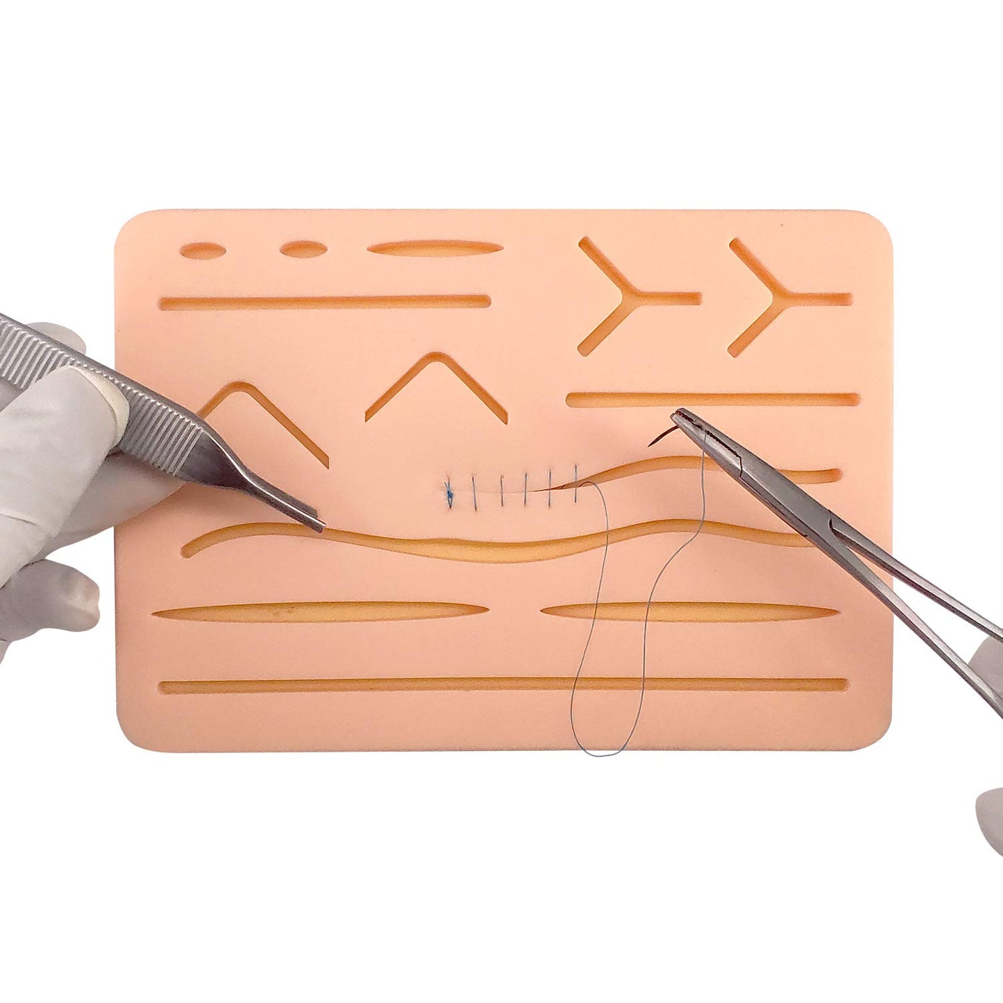 Pad para práctica de sutura